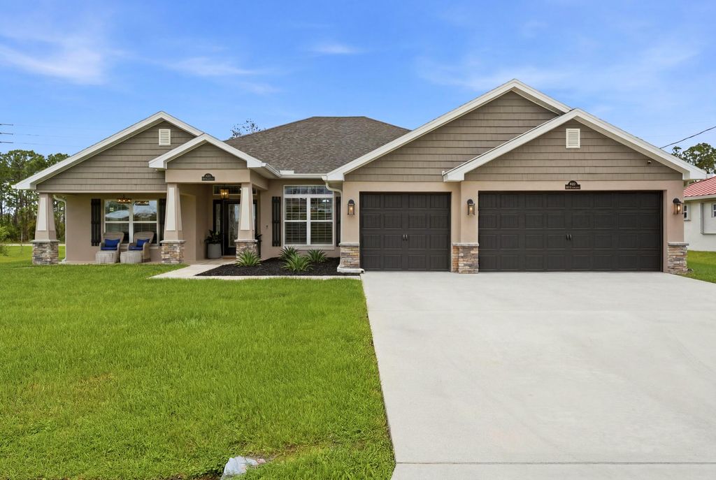 Photo of 5825 NW Bates Avenue, Port Saint Lucie, FL 34986 (MLS # B26041780)