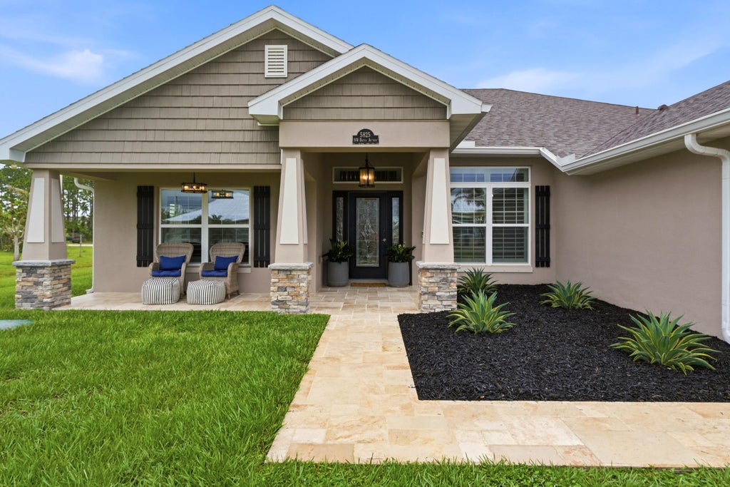 Photo of 5825 NW Bates Avenue, Port Saint Lucie, FL 34986 (MLS # B26041780)