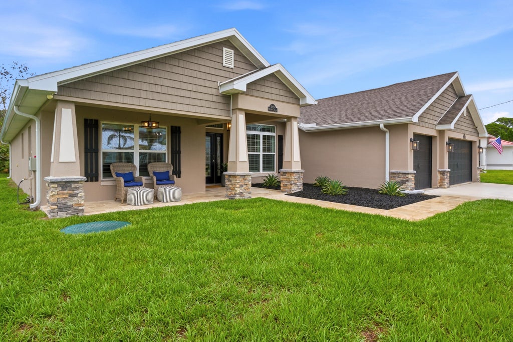 Photo of 5825 NW Bates Avenue, Port Saint Lucie, FL 34986 (MLS # B26041780)