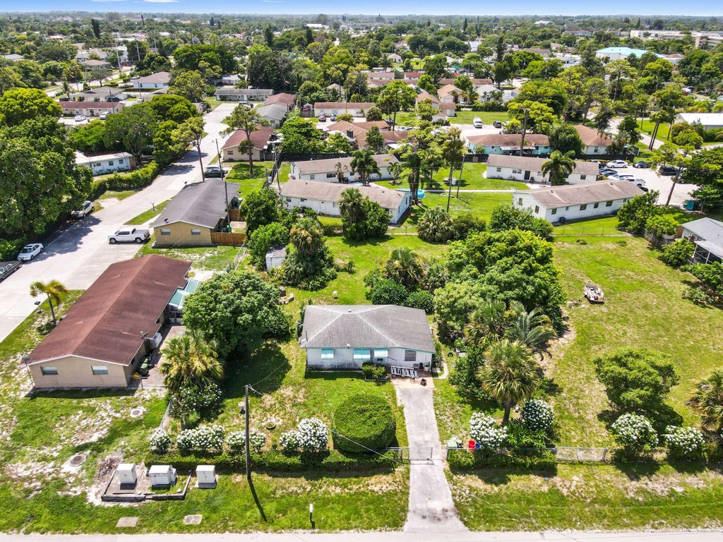 Photo of 2653 Gulfstream Road, Palm Springs, FL 33406 (MLS # R11111823)