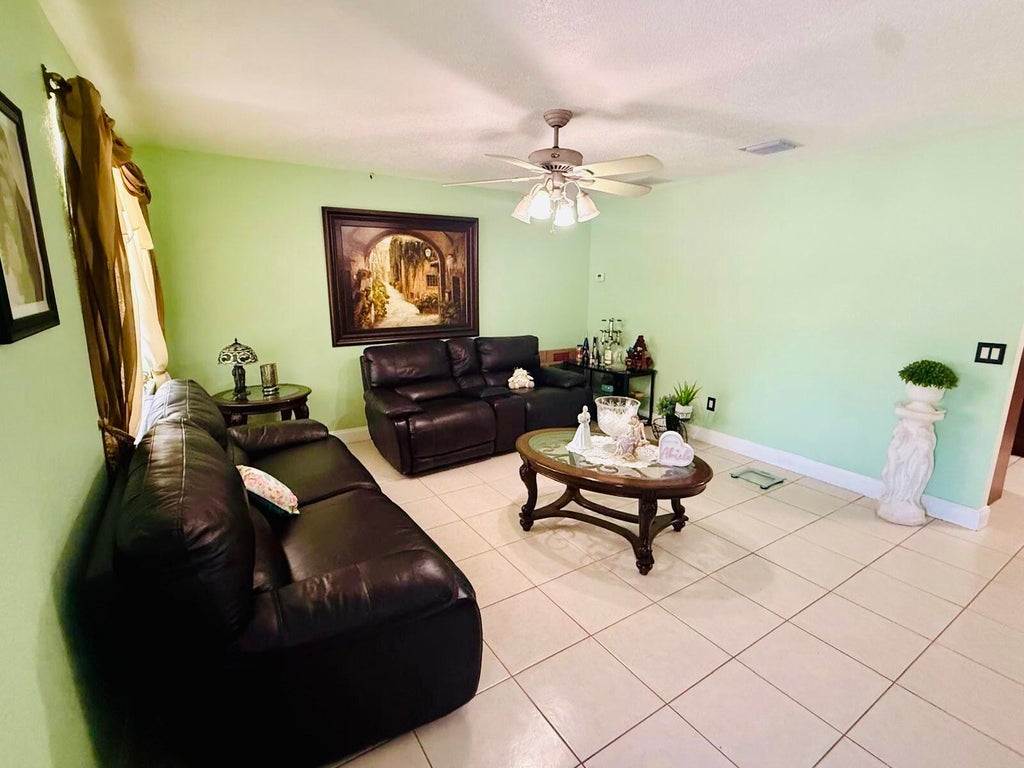 Photo of 3335 10th Avenue N, Palm Springs, FL 33461 (MLS # B26055840)