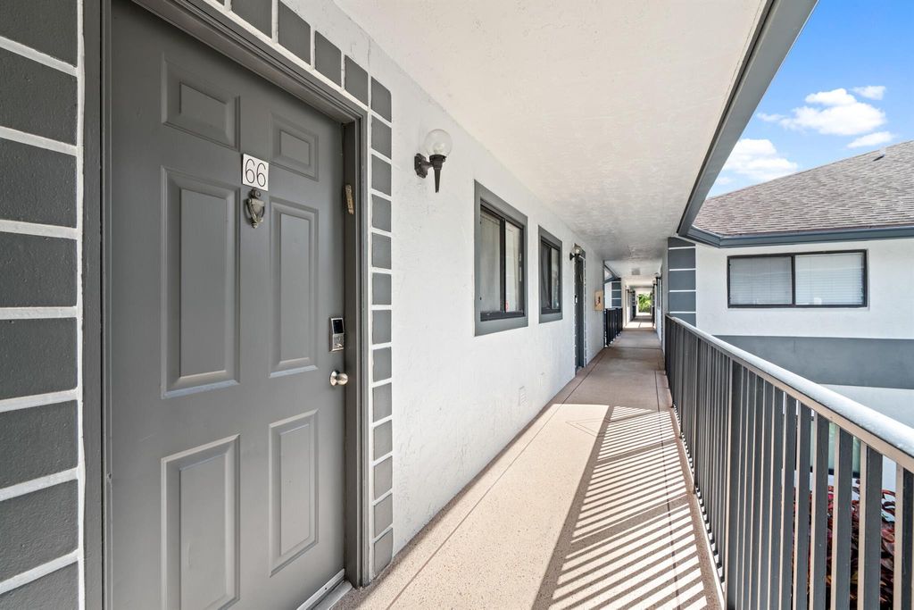 Photo of 15364 Lakes Of Delray Boulevard #66, Delray Beach, FL 33484 (MLS # R11131483)