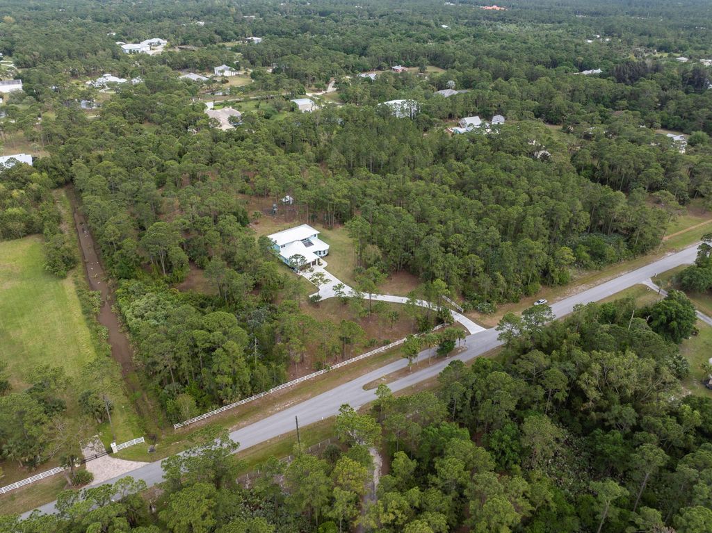 Photo of 5651 SW Mistletoe Lane, Palm City, FL 34990 (MLS # R10982466)