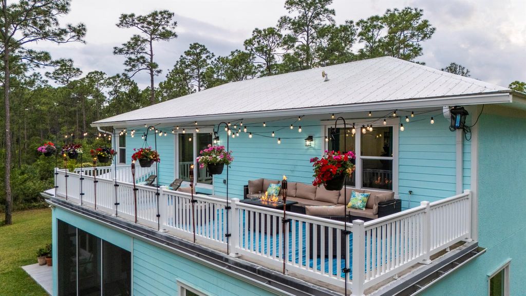 Photo of 5651 SW Mistletoe Lane, Palm City, FL 34990 (MLS # R10982466)