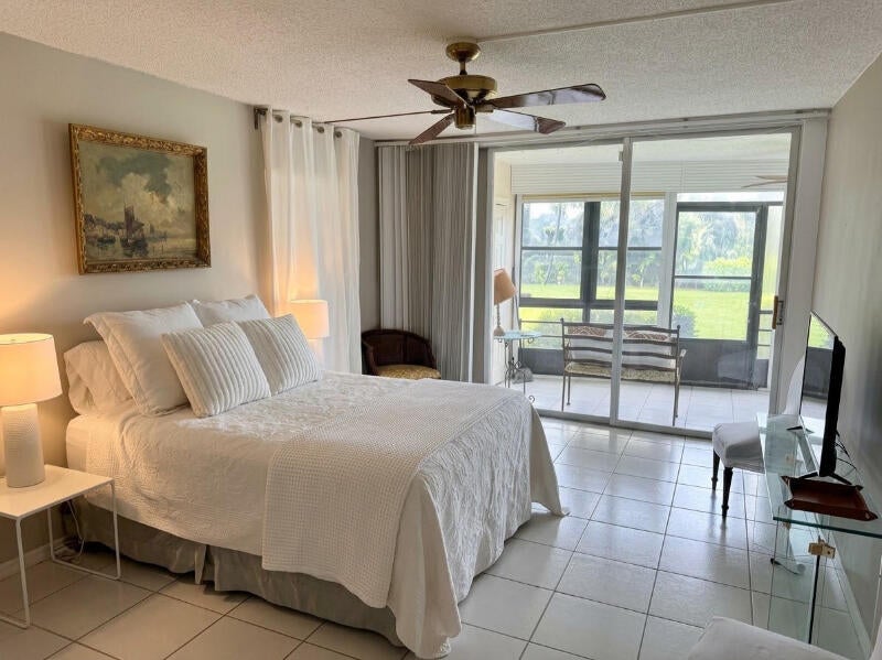 Photo of 23099 BARWOOD Lane N #101, Boca Raton, FL 33428 (MLS # B26091240)