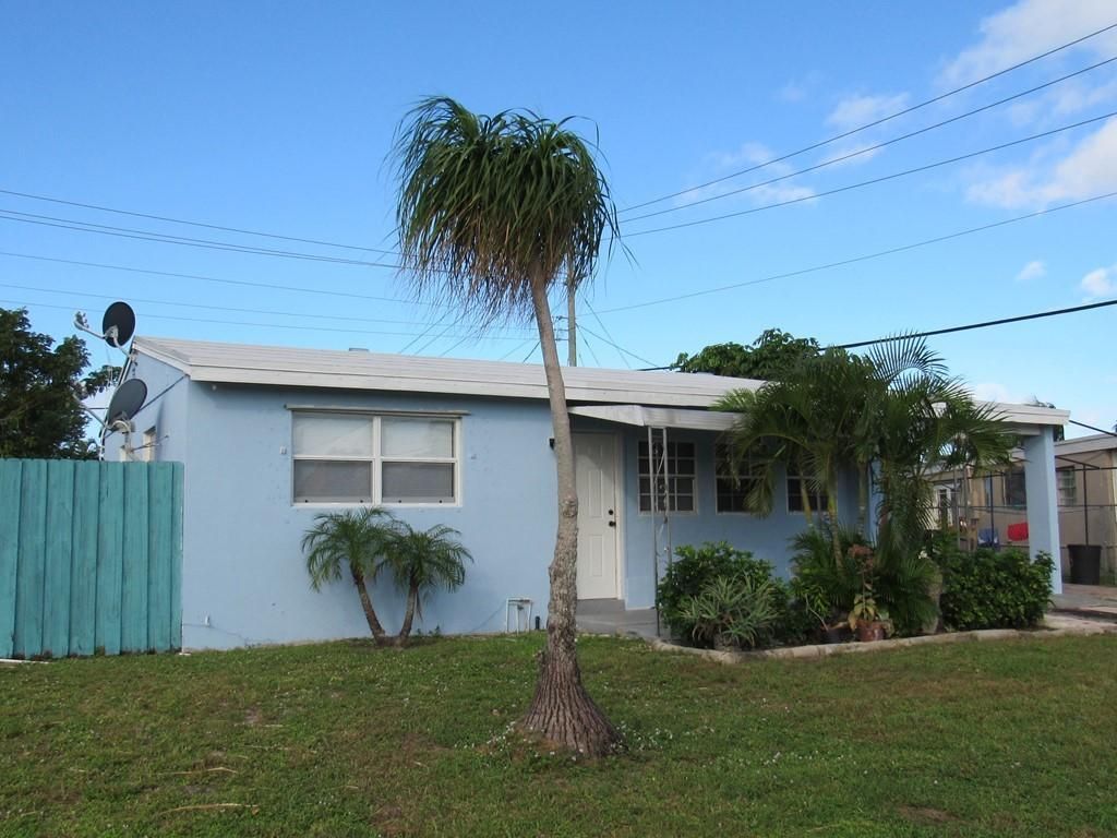 Photo of 483 Seminole Drive Dr, Lake Worth Beach, FL 33462 (MLS # R10673720)