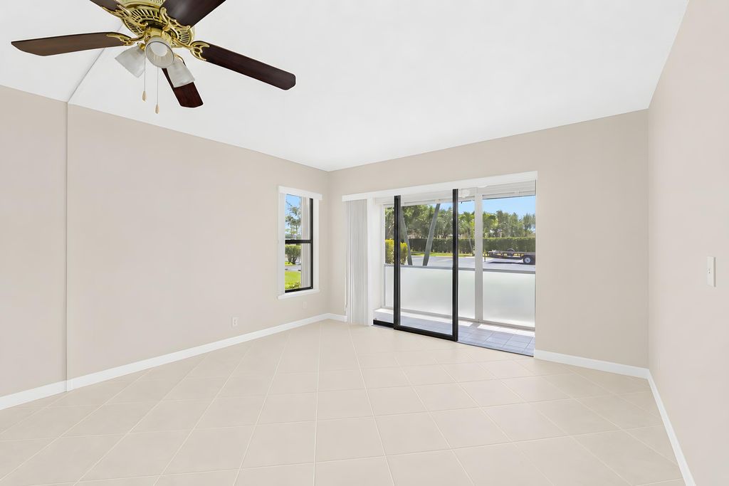 Photo of 821 Sky Pine Way #D1, Greenacres, FL 33415 (MLS # B26031576)