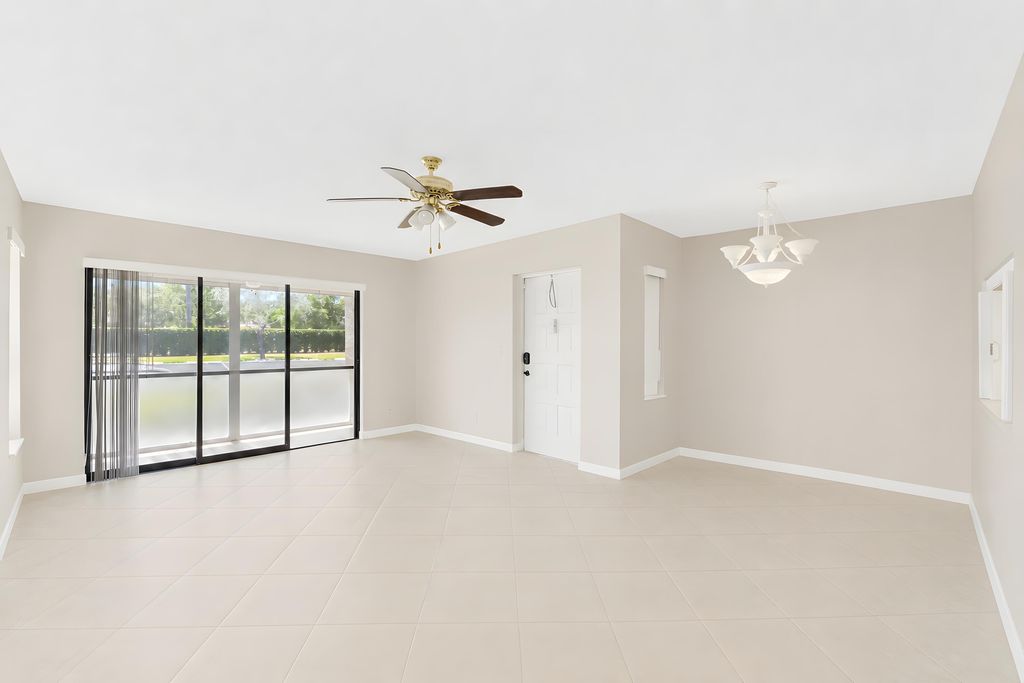 Photo of 821 Sky Pine Way #D1, Greenacres, FL 33415 (MLS # B26031576)