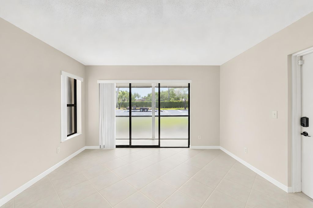 Photo of 821 Sky Pine Way #D1, Greenacres, FL 33415 (MLS # B26031576)