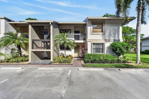 Photo of 12926 BRIARLAKE Drive #104b, Palm Beach Gardens, FL 33418 (MLS # B26086049)