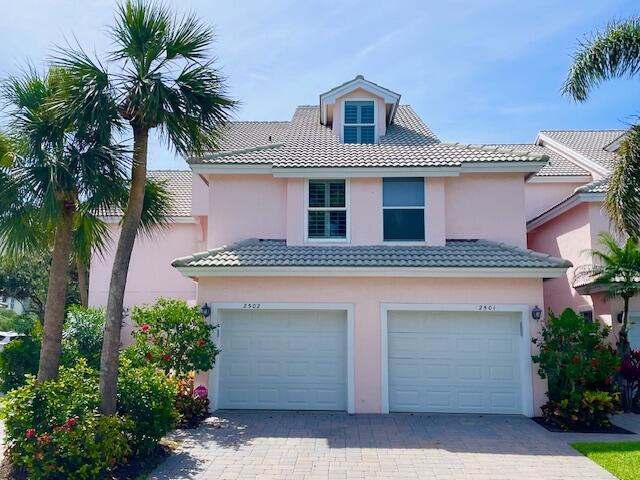 Available 2025 OFF-SEASON $4,000/mo. Walk to the turquoise waters of Jupiter Beach from this 2nd floor, 3 bedroom + loft, 3 full bath end unit residence in the gated, beachside community of The Estuary. Located on the back nine of the Jupiter Dunes Golf Course with views of the golf course & lake, this 3 bedroom residence offers 1st class accommodations with a gorgeous renovation including updated kitchen (granite & stainless steel), 3 updated baths, gorgeous custom moldings, huge water & golf front lanai, tiled flooring throughout, flat screen TV's, ceiling fans & a 1 car attached garage. Fully equipped for a great summer or winter rental season at Jupiter Beach. Walk to golf, shopping, parks & all of the waterfront restaurants in the Inlet District.