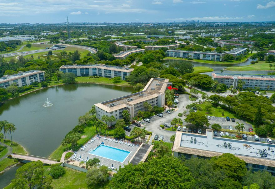 Serenity with Open concept upgrades living & dining with beautiful Lake view. This newly renovated 2-bedroom, 2-bathroom condo offers a peaceful and comfortable lifestyle. Master Extensive Walk-in Closet. Upgraded kitchen appliances, Wine Fridge, beautiful porcelain floors throughout. This community has great amenities: Tennis Courts, Heated Pool, Club House, Pickle ball. Enjoy the beautiful Lake view from the comfort of your Living room! The Wynmoor community offers 24-hour security and a vibrant, active lifestyle you have been dreaming of.  *Seller offering CREDIT TOWARDS BUYER'S CLOSING COST.