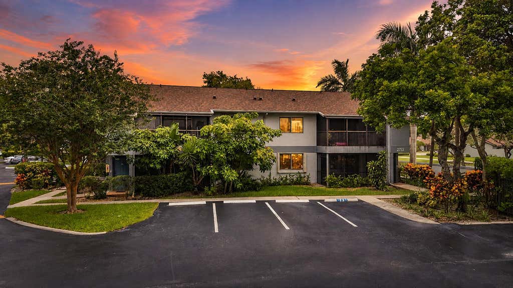 Photo of 2753 S OAKLAND FOREST Drive #102, Oakland Park, FL 33309 (MLS # B26059187)