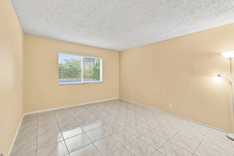 Tiny photo for 2753 S OAKLAND FOREST Drive #102, Oakland Park, FL 33309 (MLS # B26059187)