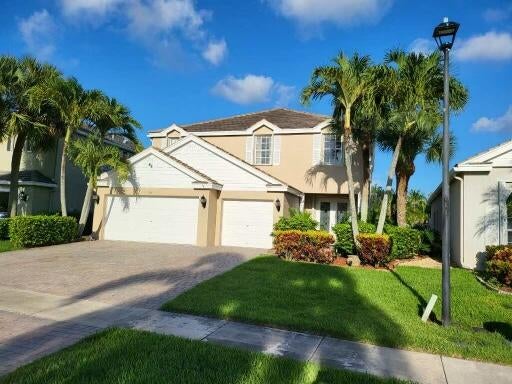 Photo of 150 Kensington Way, Royal Palm Beach, FL 33414 (MLS # R10802846)