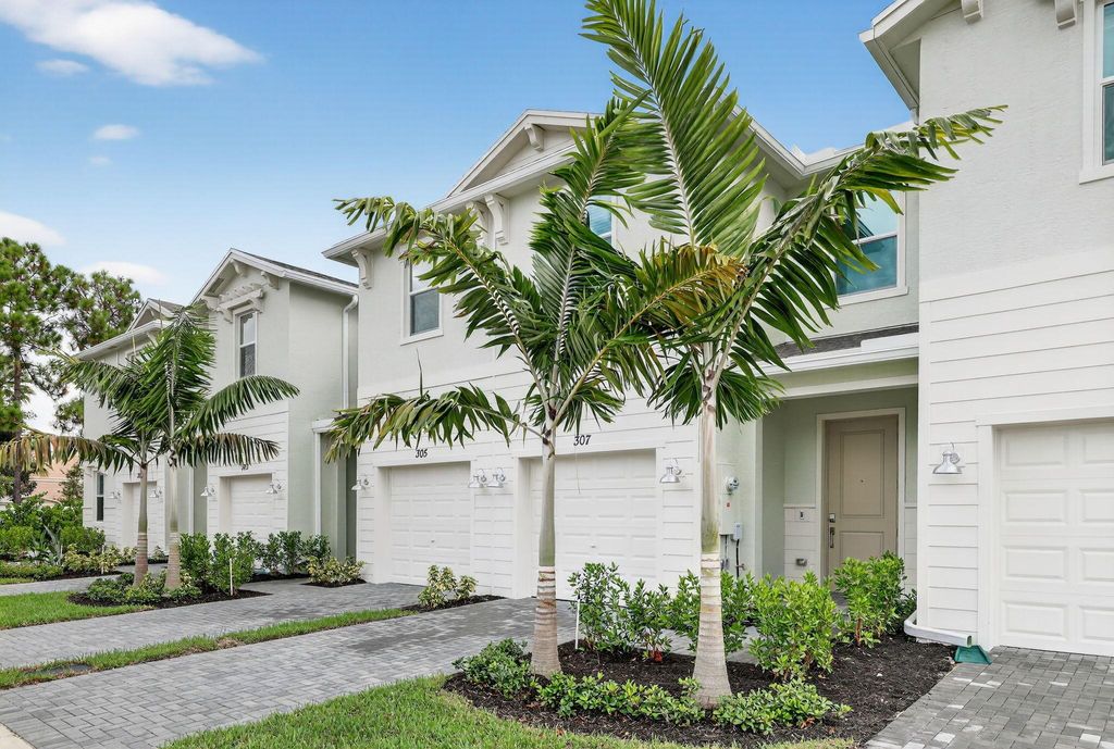 Photo of 307 SE Crossoak Lane, Port St Lucie, FL 34984 (MLS # R11123592)