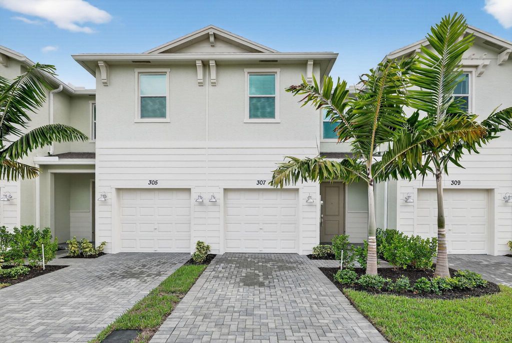 Photo of 307 SE Crossoak Lane, Port St Lucie, FL 34984 (MLS # R11123592)