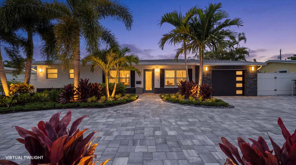 Photo of 765 Lagoon Drive, North Palm Beach, FL 33408 (MLS # B26059374)