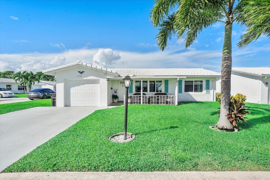 Bright & welcoming 2BD/2BA in Leisureville, active adult community! Move-in ready with impact windows, newer A/C, corner lot, inviting front porch, and a screened back patio for true Florida indoor-outdoor living. Why pay rising condo fees? Own a single-family and enjoy added space, storage & privacy. Furniture available if desired. Quick access to the Congress Blvd entrance. Low HOA includes lawn care & amenities: free 18-hole Par-3 golf, 3 active clubhouses, heated pools, and more. Prime location just minutes from the ocean, shopping & dining—an everyday value play!
