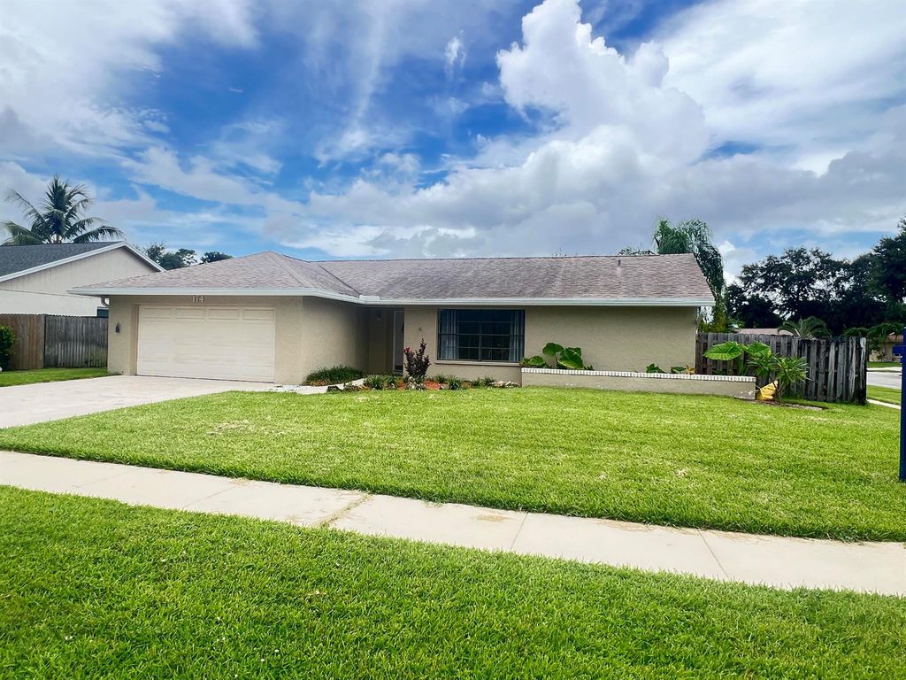 Photo of 174 Parkwood Drive, Royal Palm Beach, FL 33411 (MLS # R11094090)