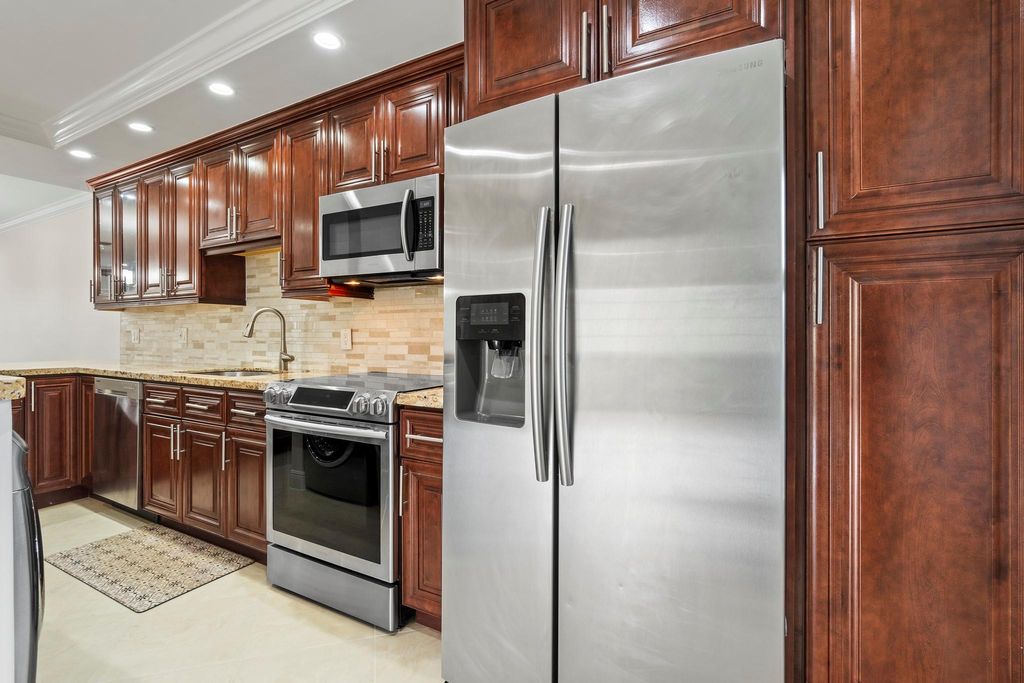 Photo of 1011 Flame Vine Avenue #201, Delray Beach, FL 33445 (MLS # F10420884)