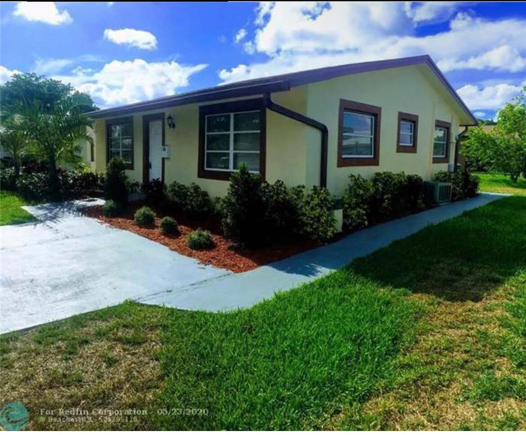 Photo of 7407 NW 58th Street, Tamarac, FL 33321 (MLS # B26012121)