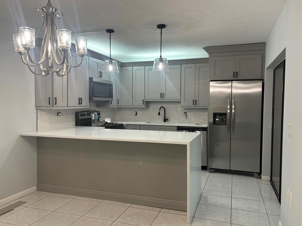 Photo of 1705 17th Ln, Palm Beach Gardens, FL 33418 (MLS # R11141161)