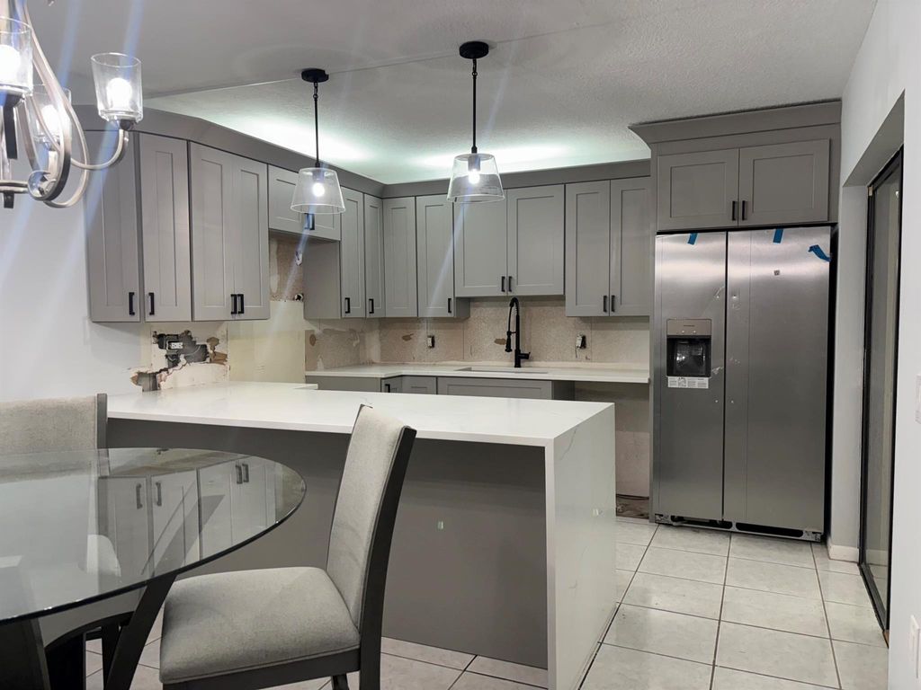 Photo of 1705 17th Ln, Palm Beach Gardens, FL 33418 (MLS # R11141161)