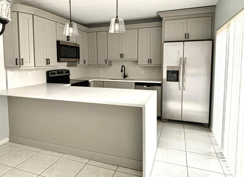 Photo of 1705 17th Ln, Palm Beach Gardens, FL 33418 (MLS # R11141161)