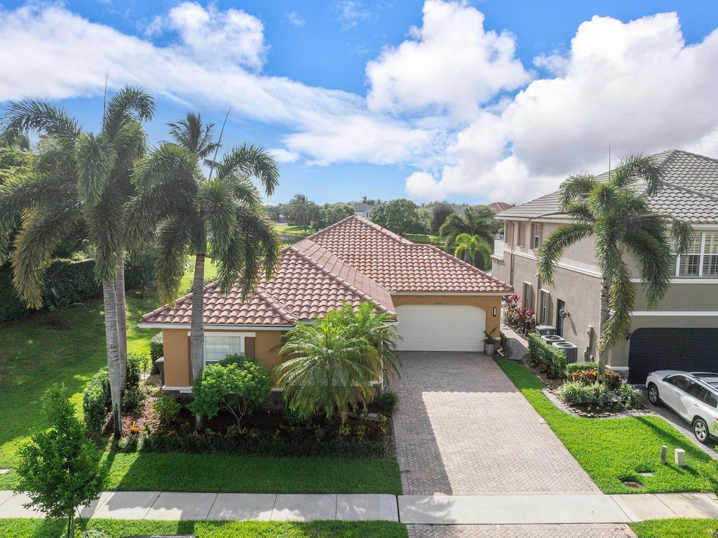 Photo of 9556 Cobblestone Creek Dr, Boynton Beach, FL 33472 (MLS # B26000627)