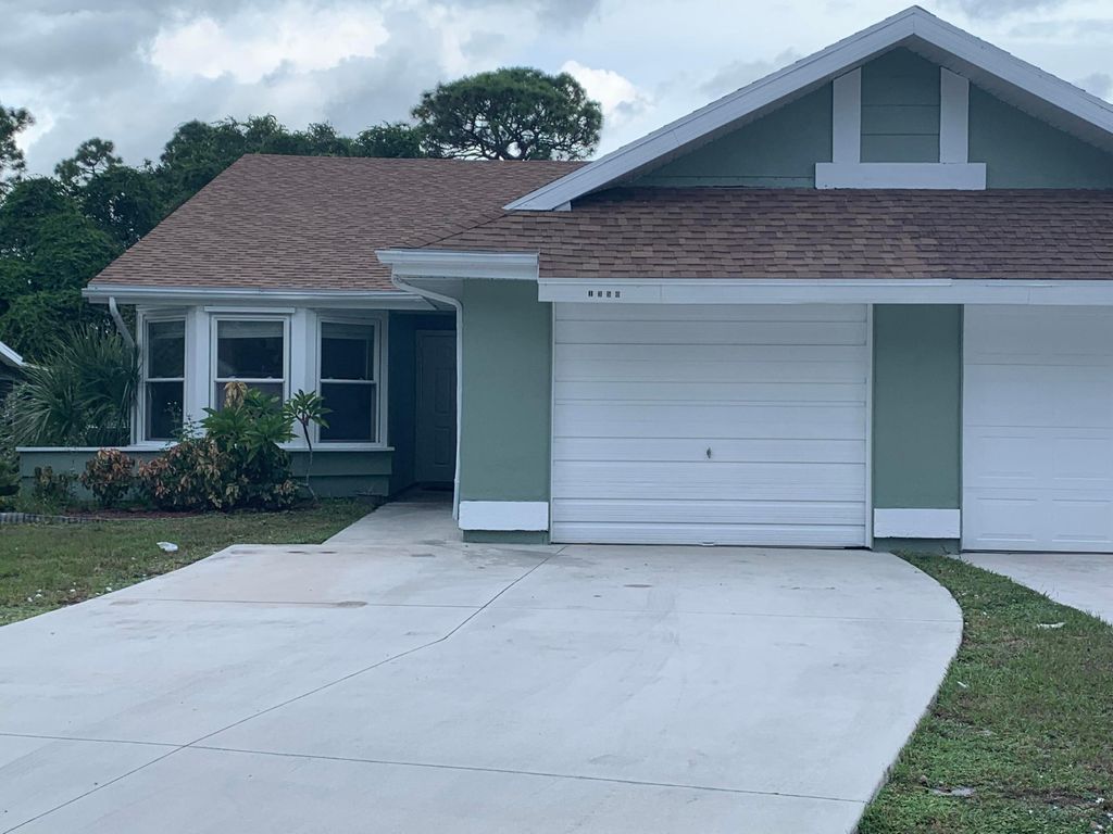 Photo of 1350 SE Rivergreen Circle, Port Saint Lucie, FL 34952 (MLS # R10912052)