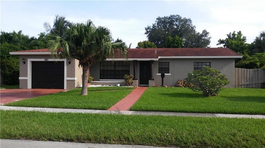 upgraded well-kept gem Recently painted. Beautifully tiled thru out w/crown moldings & wood floors in spacious bedrooms. Amazing floor plan, updated eat-in kitchen w/island, granite, stainless steel appliances, beautiful Venetian painted walls in dining/living areas. Ceiling fans, large tiled family room. bathrooms beautifully updated, garage  used as living area, can be easily converted back. Lovely back & front yard. Lots of storage! Great curb appeal Close to schools, shopping, Highway, Will Not Last!!