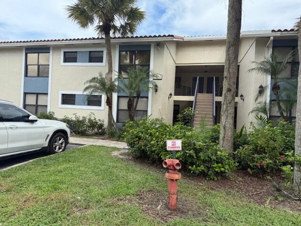 Photo of 1562 Lake Crystal Drive #E, West Palm Beach, FL 33411 (MLS # R11130712)