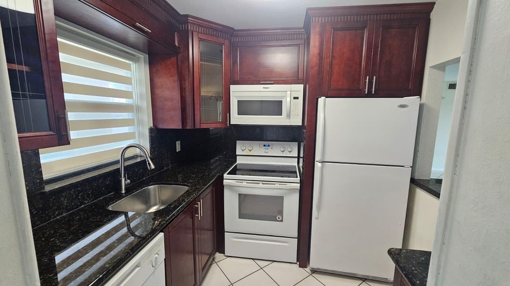 Photo of 9911 Sandalfoot Boulevard #116, Boca Raton, FL 33428 (MLS # B26037379)