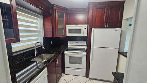 Photo of 9911 Sandalfoot Boulevard #116, Boca Raton, FL 33428 (MLS # B26037379)