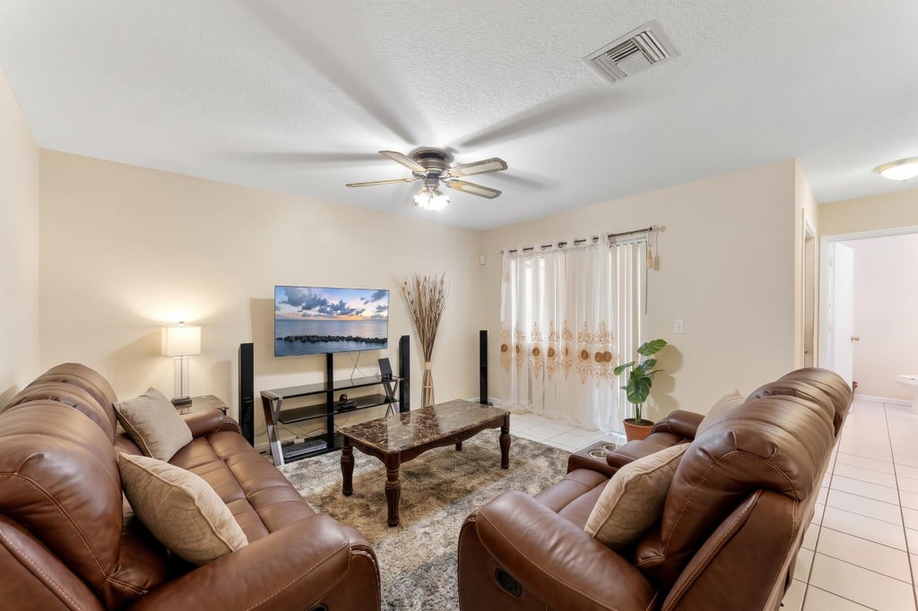 Photo of 2324 LENA Lane, West Palm Beach, FL 33415 (MLS # B26085315)