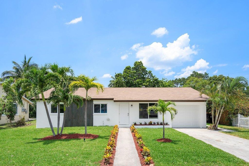 Photo of 1774 16th Avenue N, Lake Worth Beach, FL 33460 (MLS # R10989795)