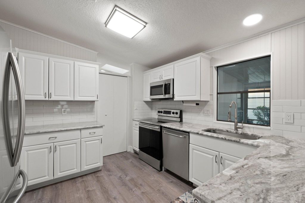 Photo of 222 Sandy Bottom Place, Fort Pierce, FL 34982 (MLS # R10940913)