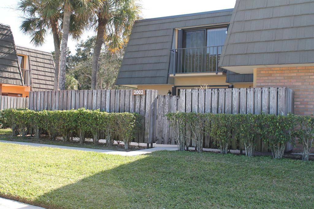 NEW UPGRADES, THIS 2B,2.5 BATH TOWNHOME HAS JUST BEEN RECENTLY UPGRADED. New cabinets and new Quartz countertops in kitchen. The unit has stainless Steel appliances and unit has washer and dryer on the first floor. All new patio fence and storage shed have just been replaced. All bathrooms have been remodeled and there is ceramic tile flooring throughout, with carpeting on the steps to the second floor. The courtyard style town home gives you privacy and is located in a great quiet neighborhood and is centrally located near restaurants, downtown West Palm Beach and shopping!