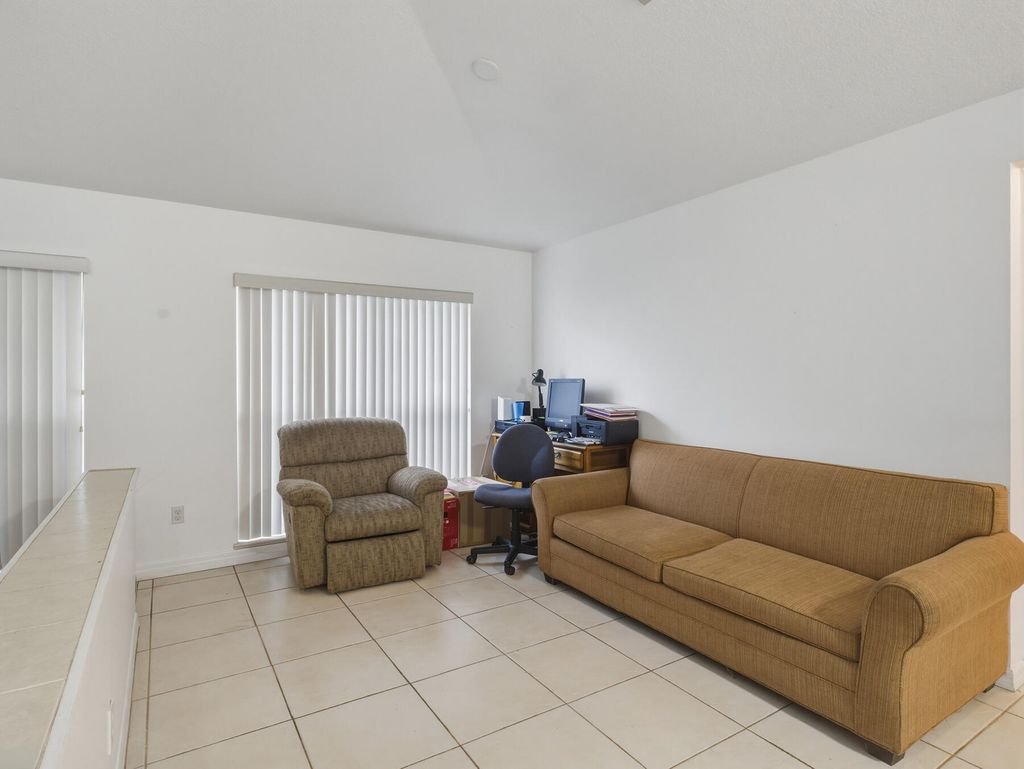 Photo of 1881 SW Buttercup Avenue, Port Saint Lucie, FL 34953 (MLS # B26011943)