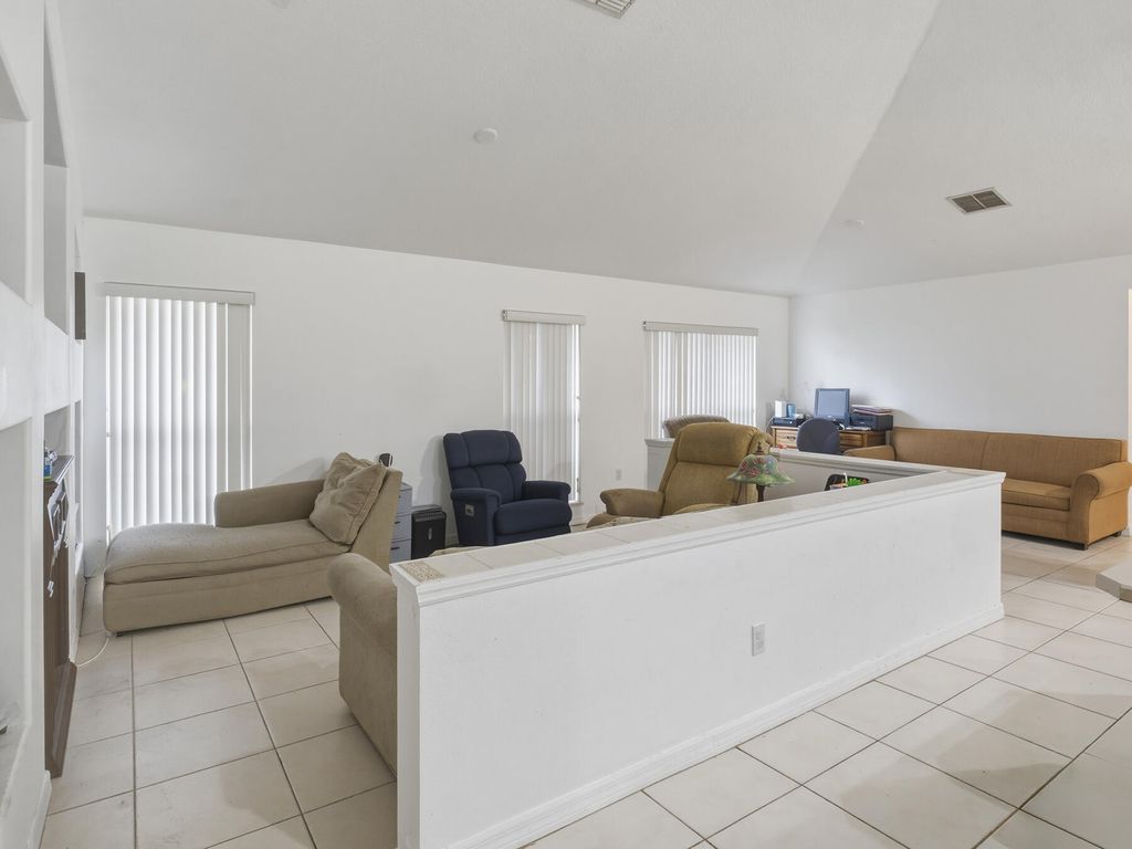 Photo of 1881 SW Buttercup Avenue, Port Saint Lucie, FL 34953 (MLS # B26011943)