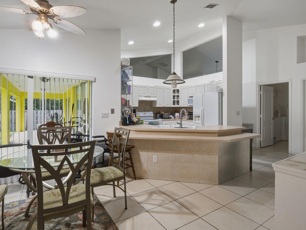 Photo of 1881 SW Buttercup Avenue, Port Saint Lucie, FL 34953 (MLS # B26011943)