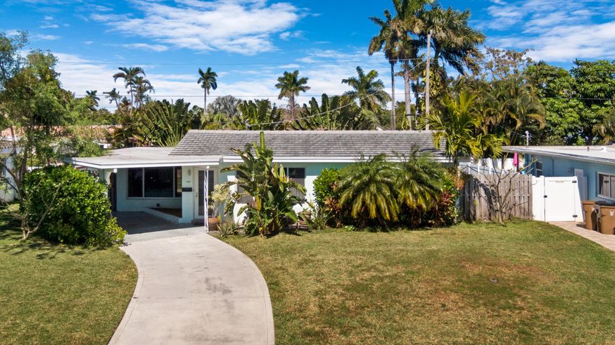 Welcome to this beautifully updated 2-bedroom, 2-bathroom home offering 1,145 square feet of bright, thoughtfully designed living space in one of Deerfield Beach's most desirable neighborhoods.
Inside, you'll find a fully renovated kitchen and bathrooms with clean, modern finishes. The spacious waterfall island anchors the kitchen, complemented by a full suite of newer appliances, including oven, dishwasher, microwave, refrigerator, and garbage disposal. Large impact windows fill the home with natural light, while original terrazzo floors add timeless character. Both bedrooms feature wraparound windows, generous closets, and ample overhead storage. Impact French doors open to the tropical backyard, creating effortless indoor-outdoor living. 
Step outside to the newly built backyard patio deck and lush landscaping - including over 11 plumeria trees, enhanced privacy, and tropical greenery. Additional highlights include a 2020 roof, a spacious carport, and a new backyard shed for storage or gardening.
Ideally located just 5 minutes from Deerfield Beach or a 15-minute bike ride away. Only 2 minutes to The Cove Shopping Center and close to Target, Starbucks, and a variety of popular dining and retail destinations. Enjoy DeGroff Park within minutes by bike or on foot, a local favorite for walking, jogging, and its own beach access.
Deerfield Beach is one of South Florida's fastest-growing coastal communities, known for its award-winning beaches, walkable fishing pier, vibrant dining scene, and strong sense of community. The area offers a relaxed beach-town atmosphere supported by amenities that appeal to both full-time residents and seasonal visitors with convenient access to major highways, airports, parks, top-rated schools, golf courses, and premier pickleball facilities. For travelers and commuters, you'll have easy access to US-1, I-95, and the Sawgrass Expressway/Turnpike on ramp via SW 10th St. FLL Int'l Airport is about 25 minutes away, Miami Int'l Airport is 40 minutes away, and Palm Beach Int'l Airport is about 30 minutes away. Whether used as a primary residence, vacation retreat, or long-term investment, the area continues to attract buyers seeking coastal living with everyday functionality.