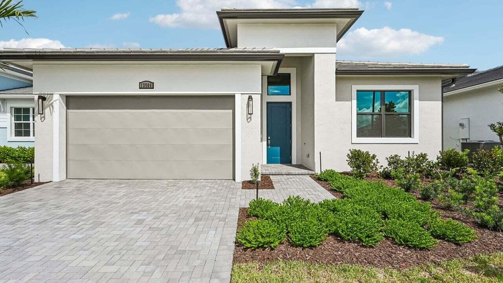 Photo of 13566 SE Grovewood Drive, Port Saint Lucie, FL 34984 (MLS # B26065625)