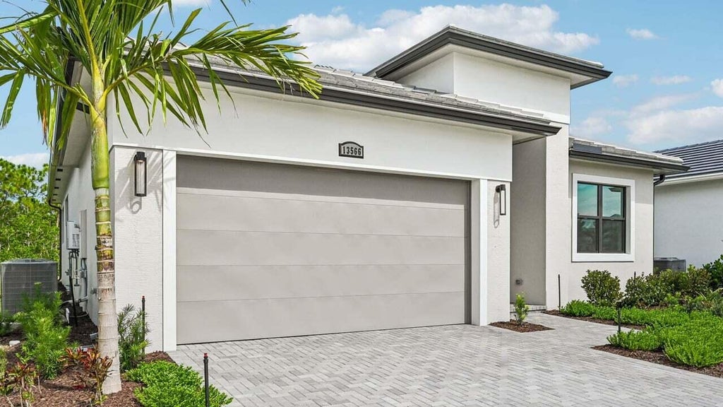 Photo of 13566 SE Grovewood Drive, Port Saint Lucie, FL 34984 (MLS # B26065625)