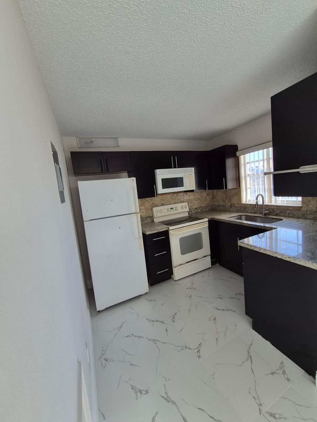 Photo of 3198 49th Lane S, Lake Worth, FL 33461 (MLS # R11162505)