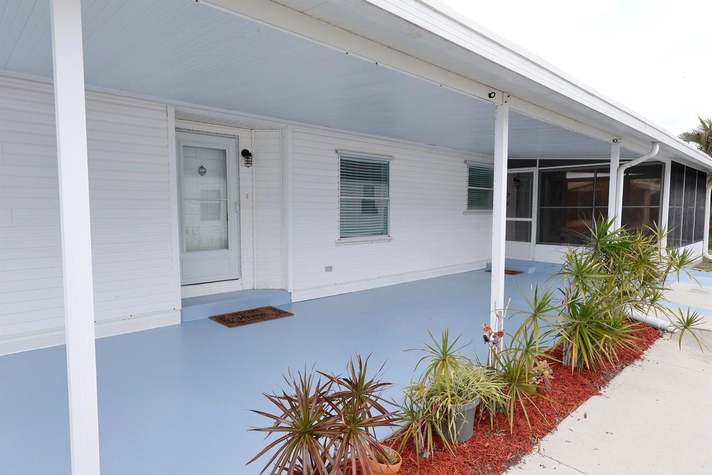 Photo of 3700 Westchester Court, Port Saint Lucie, FL 34952 (MLS # R11126651)