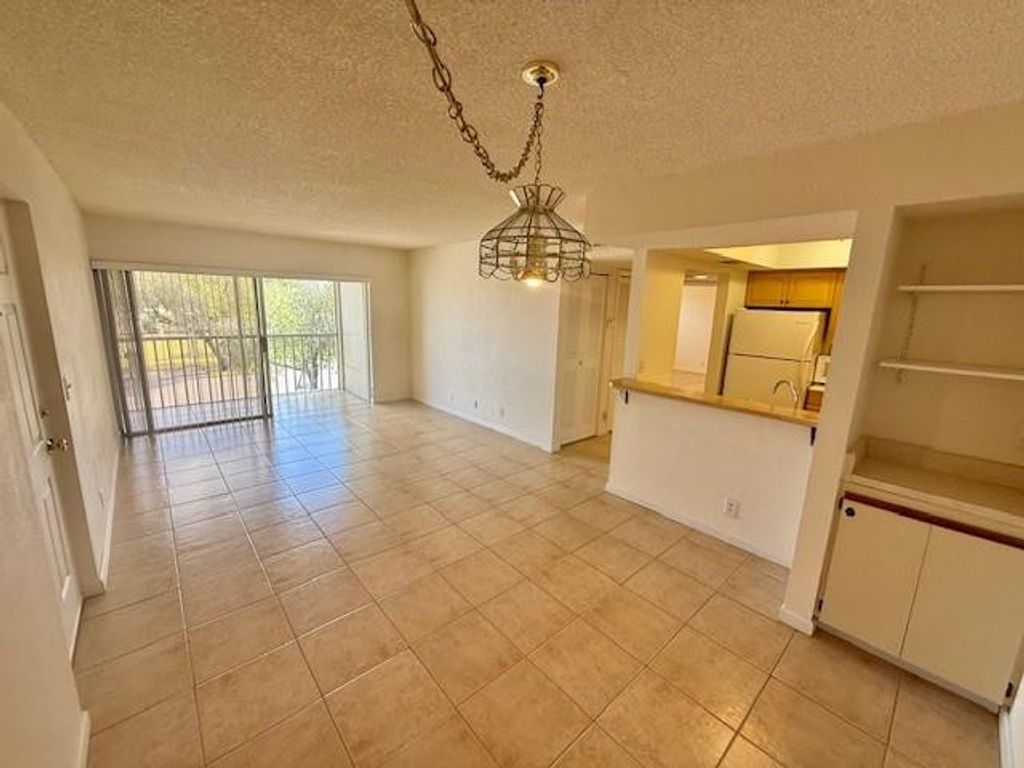 Photo of 1500 SE Royal Green Circle #203, Port Saint Lucie, FL 34952 (MLS # F10555961)