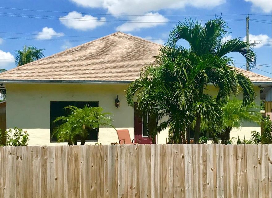 JUST REDUCED 50K!  SELLER PAID FOR 1 YR. HOME WARRANTY! INVESTORS DREAM OR DREAM PROPERTY FOR LARGE FAMILY.  THIS UNIQUE PROPERTY SITS  UPON A DOUBLE LOT WITH A 4/2 HOME SITUATED UP FRONT AND A  3/2 GUEST HOME IN THE REAR. GUEST HOUSE  HAS A FULL KITCHEN AND WASHER/DRYER & IS CURRENTLY RENTED @ $1,000/MO. THE EXTERIOR IS ADORNED BY STAGHORN FERN & VARIOUS VARIETIES OF PLANTS & PALMS.  THERE ARE ALSO 2 WORK SHEDS, ONE OF WHICH HAS POWER. 400+SF REMAINING OF BUILD OUT SPACE.  THIS REVENUE GENERATOR (OR) PRIVATE OASIS IS A MUST SEE! INVESTORS SPECIAL!! JUST REDUCED 50K AND 1 YEAR HOME WARRANTY PAID BY SELLER!!