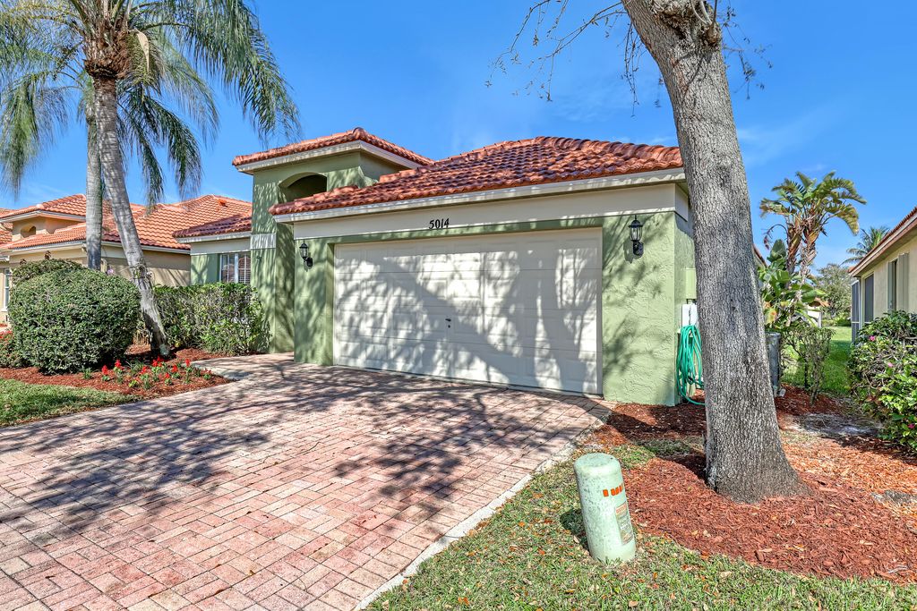 Photo of 5014 Elpine Way, Riviera Beach, FL 33418 (MLS # R10959850)